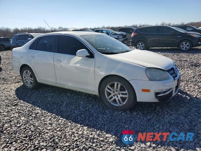 Czwarte zdjęcie samochodu z boku: 2007 VOLKSWAGEN JETTA WOLFSBURG VIN:3VWEF71K57M183834 - miniatura
