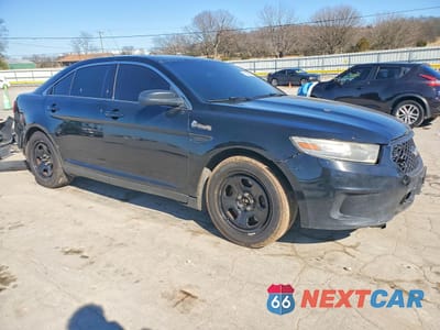 Czwarte zdjęcie samochodu z boku: 2014 FORD TAURUS POLICE INTERCEPTOR VIN:1FAHP2MK3EG120210 - miniatura