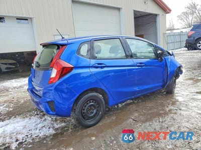 Trzecie zdjęcie samochodu z tyłu: 2016 HONDA FIT LX VIN:JHMGK5H54GX032651 - miniatura