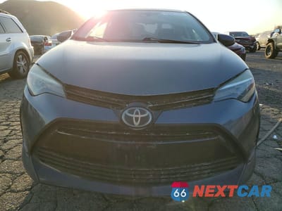 Piąte zdjęcie samochodu w środku: 2018 TOYOTA COROLLA L VIN:5YFBURHE4JP756102 - miniatura