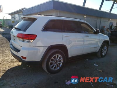 Trzecie zdjęcie samochodu z tyłu: 2014 JEEP GRAND CHEROKEE LAREDO VIN:1C4RJEAG8EC433097 - miniatura