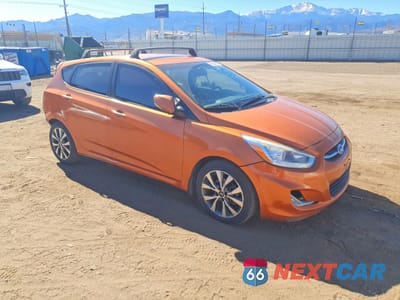 Czwarte zdjęcie samochodu z boku: 2015 HYUNDAI ACCENT SPORT VIN:KMHCU5AE5FU225679 - miniatura