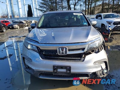 Piąte zdjęcie samochodu w środku: 2020 HONDA PILOT EXL VIN:5FNYF6H58LB021494 - miniatura