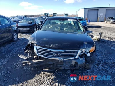 Piąte zdjęcie samochodu w środku: 2009 KIA OPTIMA LX VIN:KNAGE228895310408 - miniatura