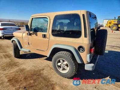Drugie zdjęcie samochodu z przodu: 1999 JEEP WRANGLER / TJ SPORT VIN:1J4FY19S0XP407289 - miniatura