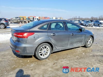 Trzecie zdjęcie samochodu z tyłu: 2015 FORD FOCUS SE VIN:1FADP3F23FL346998 - miniatura
