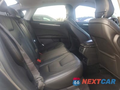 Zdjęcie 10 z 12 samochodu: 2014 FORD FUSION TITANIUM HEV VIN:3FA6P0RU5ER379103 - miniatura
