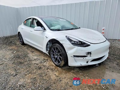 Czwarte zdjęcie samochodu z boku: 2019 TESLA MODEL 3 VIN:5YJ3E1EB3KF452916 - miniatura