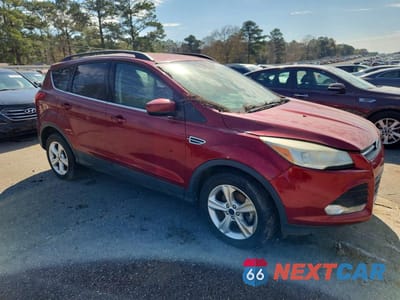 Czwarte zdjęcie samochodu z boku: 2016 FORD ESCAPE VIN:1FMCU0GX5GUB31539 - miniatura