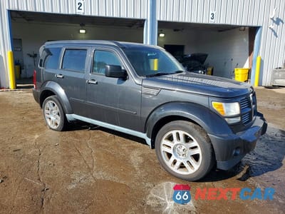Czwarte zdjęcie samochodu z boku: 2011 DODGE NITRO HEAT VIN:1D4PT4GK5BW576111 - miniatura