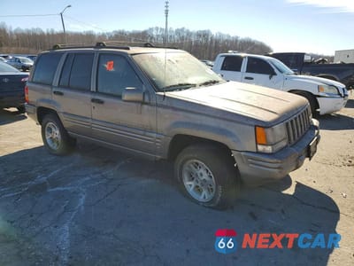 Czwarte zdjęcie samochodu z boku: 1998 JEEP GRAND CHEROKEE LIMITED VIN:1J4GZ78YXWC355279 - miniatura