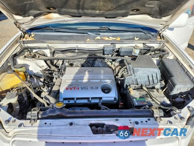 Zdjęcie 12 z 13 samochodu: 2004 TOYOTA HIGHLANDER VIN:JTEEP21A840062011 - miniatura