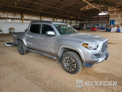Czwarte zdjęcie samochodu z boku: 2021 TOYOTA TACOMA DOUBLE CAB VIN:3TYAZ5CN9MT011214 - miniatura