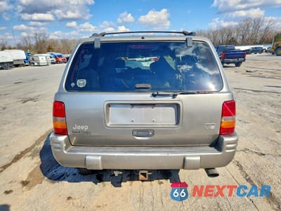 Zdjęcie 6 z 13 samochodu: 1998 JEEP GRAND CHEROKEE LIMITED 5.9L VIN:1J4GZ88Z0WC119450 - miniatura