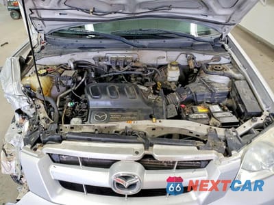 Zdjęcie 12 z 12 samochodu: 2005 MAZDA TRIBUTE S VIN:4F2CZ96155KM51685 - miniatura