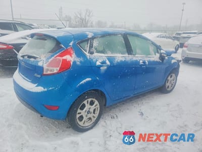Trzecie zdjęcie samochodu z tyłu: 2016 FORD FIESTA SE VIN:3FADP4EJ8GM149307 - miniatura
