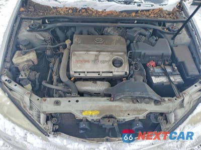 Zdjęcie 11 z 12 samochodu: 2003 TOYOTA CAMRY LE VIN:4T1BF32K93U551642 - miniatura