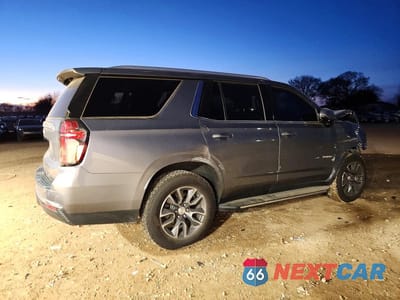 Trzecie zdjęcie samochodu z tyłu: 2021 CHEVROLET TAHOE C1500 LT VIN:1GNSCNKD0MR234645 - miniatura