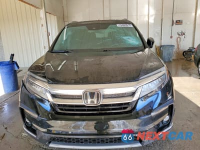 Piąte zdjęcie samochodu w środku: 2022 HONDA PILOT TOURING VIN:5FNYF6H67NB073839 - miniatura