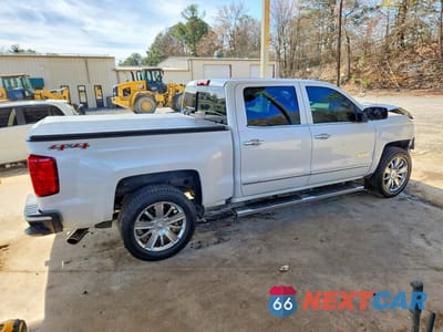 Trzecie zdjęcie samochodu z tyłu: 2017 CHEVROLET SILVERADO K1500 HIGH COUNTRY VIN:3GCUKTEJ8HG384292 - miniatura