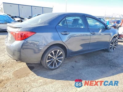 Trzecie zdjęcie samochodu z tyłu: 2018 TOYOTA COROLLA L VIN:5YFBURHE7JP792561 - miniatura