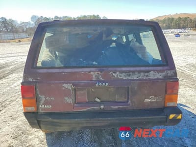 Zdjęcie 6 z 13 samochodu: 1992 JEEP CHEROKEE SPORT VIN:1J4FJ88S3NL116305 - miniatura