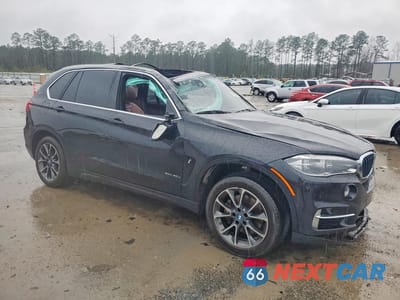 Czwarte zdjęcie samochodu z boku: 2018 BMW X5 XDR40E VIN:5UXKT0C59J0W03116 - miniatura