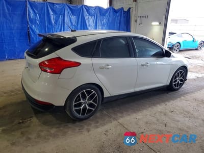 Trzecie zdjęcie samochodu z tyłu: 2017 FORD FOCUS SEL VIN:1FADP3M2XHL248802 - miniatura