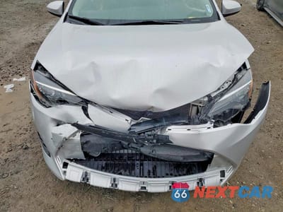 Zdjęcie 11 z 11 samochodu: 2017 TOYOTA COROLLA L VIN:5YFBURHE2HP613904 - miniatura