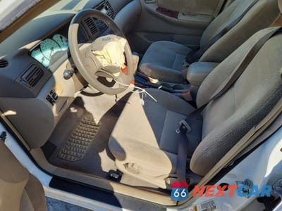 Zdjęcie 7 z 11 samochodu: 2003 TOYOTA COROLLA LE VIN:JTDBR38E632003929 - miniatura