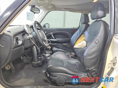 Zdjęcie 7 z 11 samochodu: 2006 MINI COOPER VIN:WMWRC33556TK16227 - miniatura