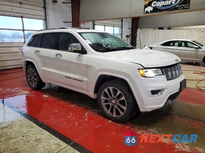 Czwarte zdjęcie samochodu z boku: 2018 JEEP GRAND CHEROKEE OVERLAND VIN:1C4RJFCT7JC173916 - miniatura