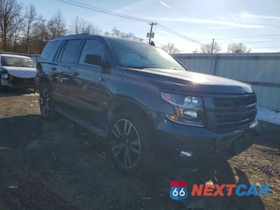Czwarte zdjęcie samochodu z boku: 2019 CHEVROLET TAHOE K1500 PREMIER VIN:1GNSKCKJ4KR183418 - miniatura