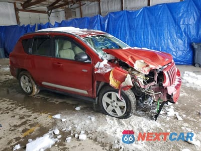 Czwarte zdjęcie samochodu z boku: 2010 JEEP COMPASS SPORT VIN:1J4NF1FB9AD620286 - miniatura