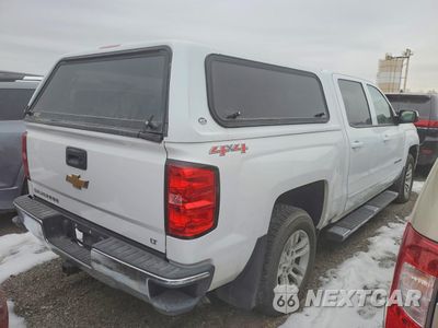 Trzecie zdjęcie samochodu z tyłu: 2017 CHEVROLET SILVERADO K1500 LT VIN:3GCUKREC4HG515755 - miniatura