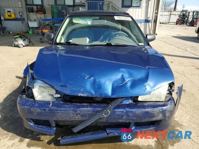 Piąte zdjęcie samochodu w środku: 1999 MAZDA PROTEGE DX VIN:JM1BJ2220X0104675 - miniatura