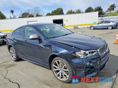 Czwarte zdjęcie samochodu z boku: 2017 BMW X4 XDRIVEM40I VIN:5UXXW7C51H0U25492 - miniatura