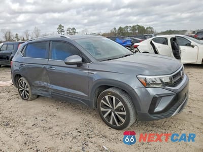 Czwarte zdjęcie samochodu z boku: 2022 VOLKSWAGEN TAOS SE VIN:3VVTX7B25NM071359 - miniatura
