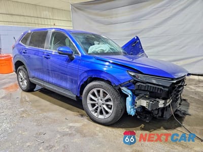 Czwarte zdjęcie samochodu z boku: 2023 HONDA CR-V EXL VIN:2HKRS4H79PH428656 - miniatura