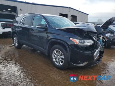 Czwarte zdjęcie samochodu z boku: 2018 CHEVROLET TRAVERSE LT VIN:1GNERGKW7JJ105627 - miniatura