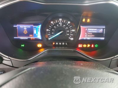 Zdjęcie 9 z 12 samochodu: 2013 FORD FUSION TITANIUM PHEV VIN:3FA6P0SUXDR242490 - miniatura