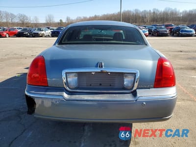Zdjęcie 6 z 11 samochodu: 1995 LINCOLN TOWN CAR BASE VIN:1LNHM81WX3Y646396 - miniatura
