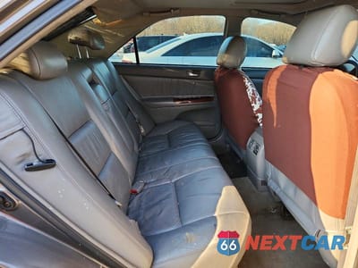 Zdjęcie 10 z 12 samochodu: 2003 TOYOTA CAMRY LE VIN:4T1BE30K73U672322 - miniatura