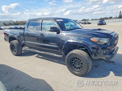 Czwarte zdjęcie samochodu z boku: 2019 TOYOTA TACOMA DOUBLE CAB VIN:3TMDZ5BN5KM064743 - miniatura