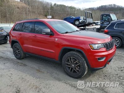 Czwarte zdjęcie samochodu z boku: 2017 JEEP GRAND CHEROKEE TRAILHAWK VIN:1C4RJFLG7HC699721 - miniatura