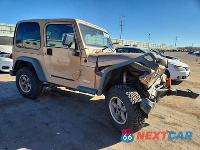 Czwarte zdjęcie samochodu z boku: 1999 JEEP WRANGLER / TJ SPORT VIN:1J4FY19S0XP407289 - miniatura