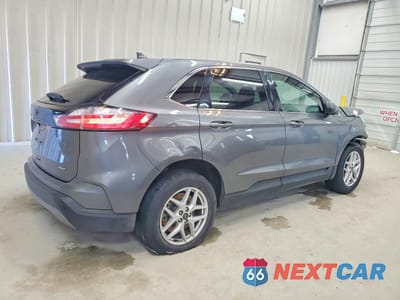 Trzecie zdjęcie samochodu z tyłu: 2023 FORD EDGE SEL VIN:2FMPK4J96PBA21145 - miniatura