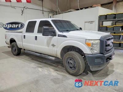 Czwarte zdjęcie samochodu z boku: 2014 FORD F250 SUPER DUTY VIN:1FT7W2BT9EEA43536 - miniatura