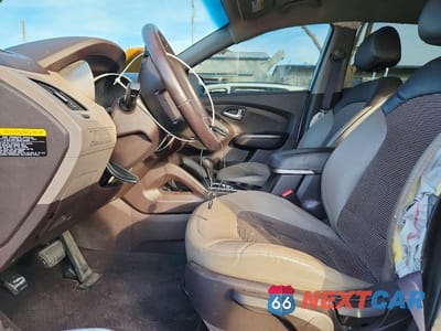 Zdjęcie 7 z 12 samochodu: 2012 HYUNDAI TUCSON GLS VIN:KM8JU3AC4CU536655 - miniatura