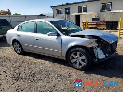 Czwarte zdjęcie samochodu z boku: 2002 NISSAN ALTIMA BASE VIN:1N4AL11D32C108526 - miniatura